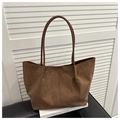 Detail view of brown suede tote bag featuring center seam and matte leather texture - Black without Pendant
