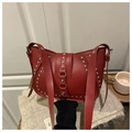 Vintage punk style red crescent saddle bag with silver metal rivets and glossy leather - Red
