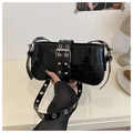 Glossy black baguette bag with crocodile texture and metallic eyelet shoulder strap - Black