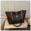 Deep brown leather tote bag with gold chain straps and a small deer charm detail - Brown