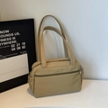 Minimalist khaki nylon shoulder bag with multi-pocket design and zip closure for daily use - Khaki