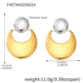 Macro detail of two-tone hammered texture on stainless steel large crescent earrings - Gold & Silver Two-Tone Moon Hammered Earrings (F407)