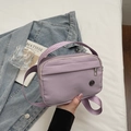 Light purple waterproof nylon crossbody bag with wide strap and multiple pockets - Purple