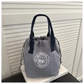 Borsa a secchiello grigia impermeabile con manici blu scuro e stampa orsetto - Blu