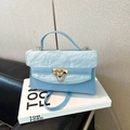 Fashionable sky blue crossbody bag with pleated texture and golden chain lock - Blue