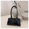 Detail of black leather underarm bag with metal buckle and long shoulder strap - Black