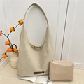 Minimalist cream white faux leather tote bag set with matching pouch and logo detail - Off White