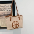 Bolso tote retro de paja beige con ribete de cuero marrón y gran logotipo de letra - Caqui