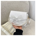 White shoulder bag with large organza bow and elegant pearl handle for women - White