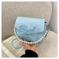 Light blue faux leather crossbody bag with mesh bow and decorative pearl chain strap - Blue