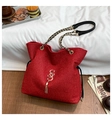 Chic red sequin tote bag with gold chain strap and elegant tassel accessory - Red