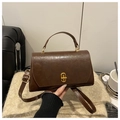 Vintage caramel brown satchel bag with glossy finish and gold U-shaped metal buckle - Brown