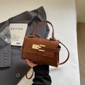 Brown litchi grain leather Kelly style handbag with gold lock and crossbody strap - Brown