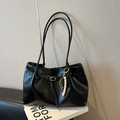 Minimalist black faux leather tote bag with colorful bead tassel and buckle detail - With Charm / Glossy Black