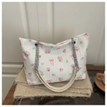 Close-up of floral tote bag with pink roses, bows and silver chain leather strap - No Pendant / White