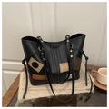 Vintage black tote bag with retro leather patches and slim handles for daily commute - Black