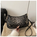 Leopard print crescent shoulder bag in grey and black with chain handle strap - Black
