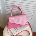 Pink snake pattern crossbody handbag with glossy finish and stylish metal buckle design - Pink