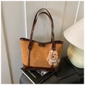 Detail of caramel suede tote bag with cat embossing and plush bear charm - With Charm / Brown