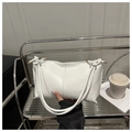 Minimalist white leather hobo bag featuring knotted shoulder straps and gold hardware - White