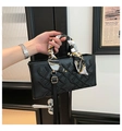 Black rectangular crossbody bag with embossed patterns and silk scarf handle detail - Black