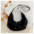 Detail of black velvet crescent hobo bag with golden studs and leather strap - Black