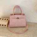 Elegant pink handbag with vertical texture, gold metal lock, and detachable strap for women - Pink Without Pendant