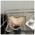 Minimalist creamy beige half-moon shoulder bag with soft leather and knot strap detail - Khaki