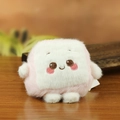 Adorable pink and white tofu plush keychain featuring a sweet embroidered smiling face - Pink