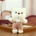 White plush bear plushie keychain wearing cute pink overalls with brown buttons - White