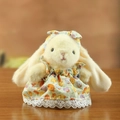 Peluche di coniglio beige a orecchie cadenti con vestito floreale arancione e fascia - 10cm / Giallo