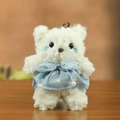 Teddy bear plush keychain featuring a white fluffy texture and blue polka dot dress - Blue Bow