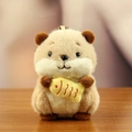 Cute beige otter plush keychain holding a small yellow fish with detailed embroidery - 13cm / Beige