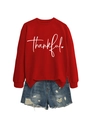 Détail d'un sweat rouge à col rond avec lettrage thankful blanc et motif de cœur - S / Rouge (Police Blanche)