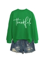 Mise à plat d'un sweat en coton vert imprimé thankful et d'un short en jean délavé - S / Vert Herbe (Police Blanche)