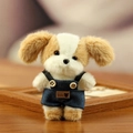 Schattige pluche puppy in blauwe spijkerbroek met baby-label en zachte vachtdetails - Lichtbruine Oren
