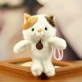 Cute tricolor plush cat keychain with a brown fashion tag and soft fur texture - Cat