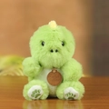 Cute green dinosaur plush toy doll with soft fur and brown leather tag detail - Sitting Posture / Green Dinosaur