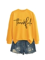 Detail of yellow long sleeve thankful sweatshirt with distressed denim shorts - Yellow (Black Font)