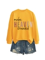 Flat lay of yellow long sleeve sweatshirt with Make Heaven Crowded text and denim shorts - Yellow (Black Print)