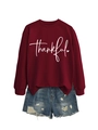 Detail of burgundy crewneck sweatshirt with thankful print and distressed denim shorts - Wine Red (White Font)