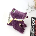 Close-up of purple plush crocodile keychain with silver metal ring and yellow accents - Purple / About 14cm Height