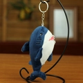 Dark blue and white plush shark keychain with silver metal ring on a display stand - 12cm / Dark Blue