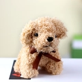 Macro detail of curly faux fur texture and brown bow on teddy dog plush toy - 12cm / Beige