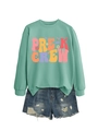 Detail of Pre-K Crew mint sweatshirt with ribbed collar and distressed denim shorts - S / Pre-K Crew Graphic / Light Green