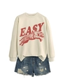 Detail of round neck sweatshirt with tiger print and side slit hem on white background - S / Sand