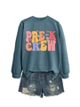 Close-up of Pre-K Crew long sleeve sweatshirt paired with distressed denim shorts - S / Pre-K Crew Graphic / Blue