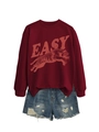 Close-up of vintage tiger print and EASY letters on burgundy crewneck sweatshirt fabric - S / Burgundy