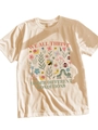 Close-up of artistic bees and flowers print with text on beige cotton T-shirt - Apricot