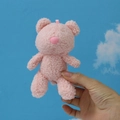 Detailed view of a pink plush teddy bear keychain in textured lamb wool material - 12cm / Pink